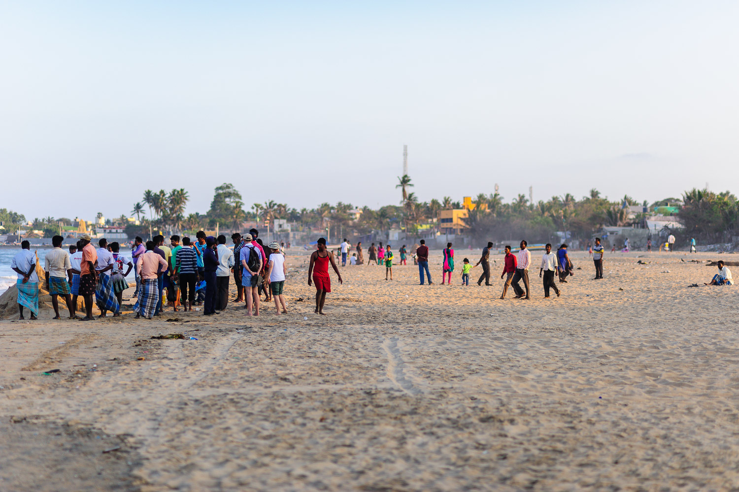 People on Kovalam Beach, Tamil Nadu. March 2015. Image no 2.
